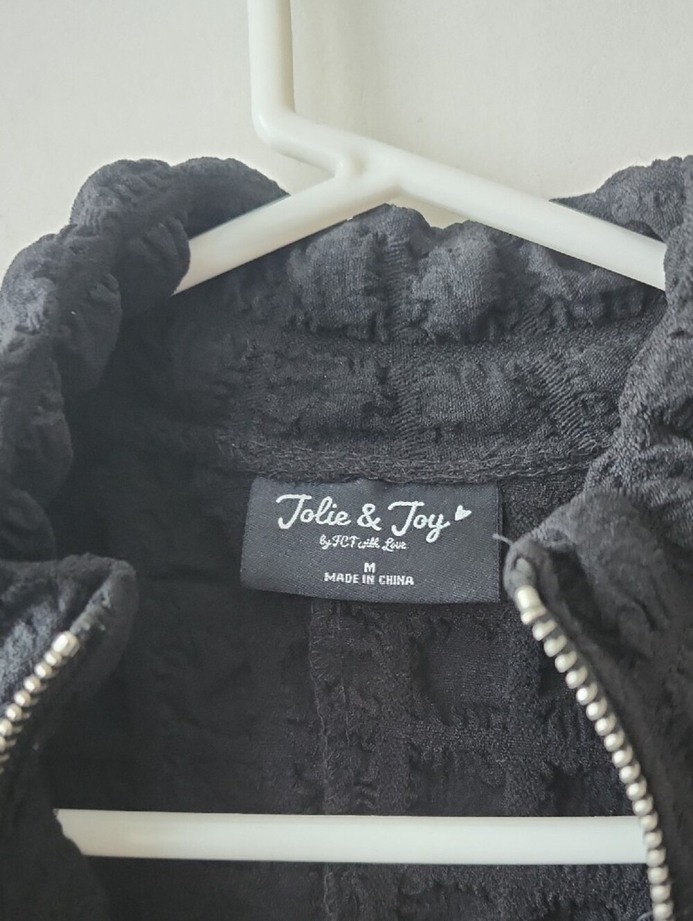 Black Textured Short-Sleeve Romper with Zip Front. New Without Tag - Picture 12 of 12
